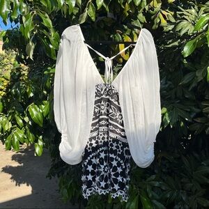 Jen’s Pirate Booty white and black puff sleeve star embroidered mini dress